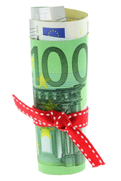 Euro banknot kırmızı şerit yay ile haddelenmiş — Stok fotoğraf