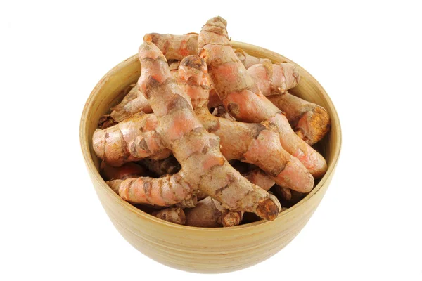 Turmeric rhizome in a wooden bowl — Stock Photo, Image