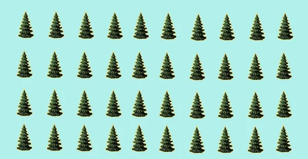 Mavi arkaplan mumunda Noel ağaçları