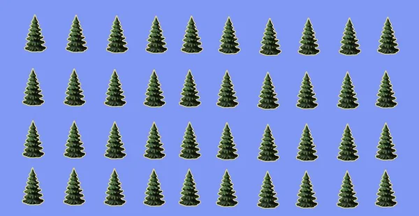 Mavi arkaplan mumunda Noel ağaçları
