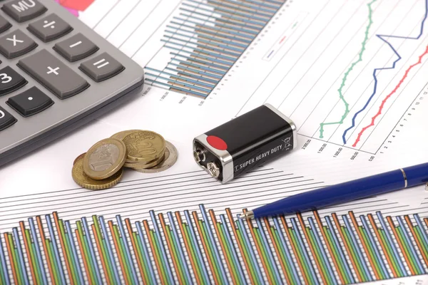 Graphics with pen and battery and coins — Stock Photo, Image