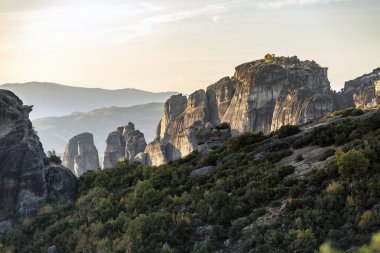 The Greek miraculous monastery on the rock formation, Meteora, Greece. Mysterious hanging over rocks monasteries near Kalabaka