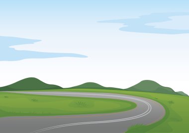 yeşil bir arazi ve yol