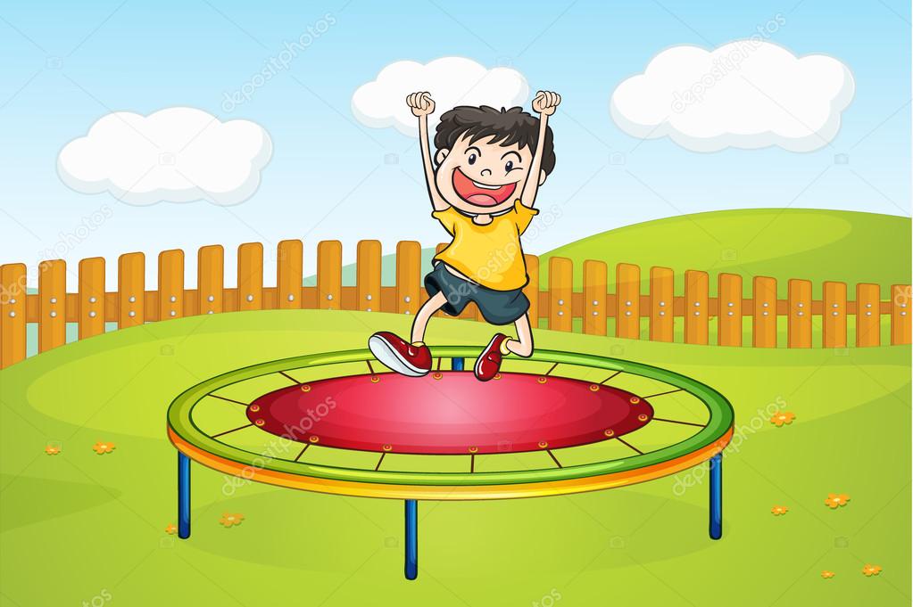 A boy jumping on a trampoline