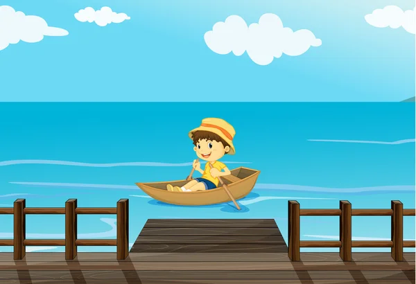 Un chico montando un barco — Vector de stock