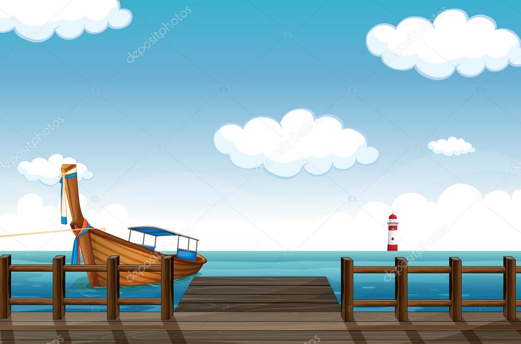 A docked boat and lighthouse