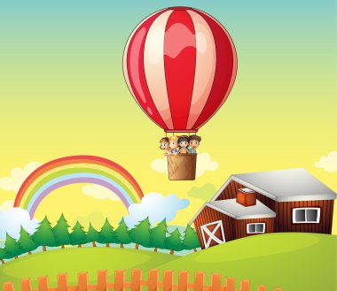 çocuklar bir hava balonu ve bir ev