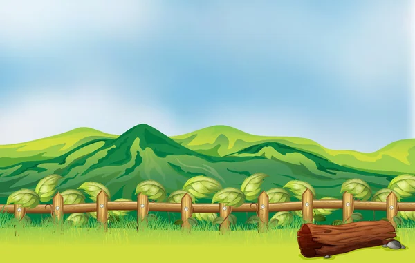 Een berg uitzicht over een houten hek — Stockvector
