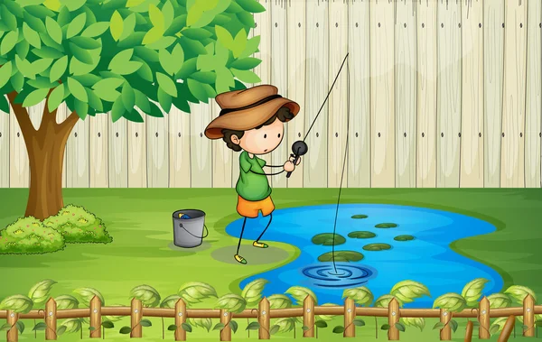 A boy fishing at the pond — Stock Vector