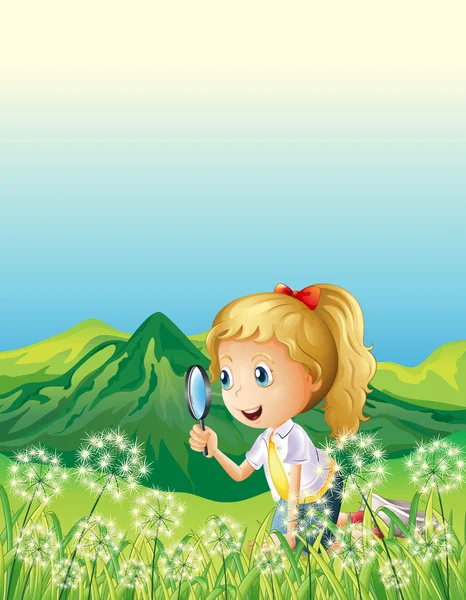 gülümseyen bir kız ve bir büyüteç