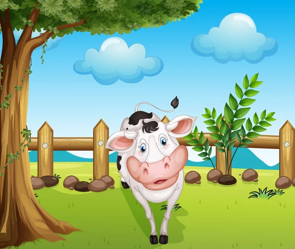 A cow inside the fence — Stock Vector