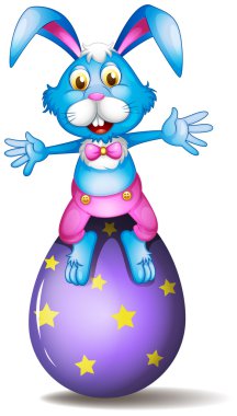 bir tavşan bir Paskalya yumurta üzerinde