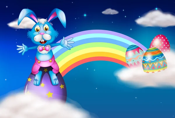 An easter bunny and eggs near the rainbow — Stock Vector