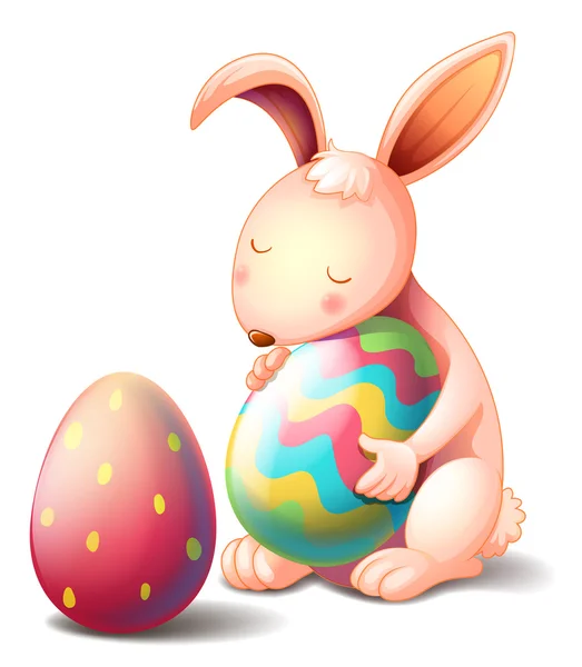 A rabbit hugging a colorful easter egg — Stock Vector