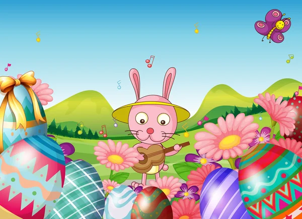 Een konijn met een gitaar en de Pasen eieren in de tuin — Stockvector