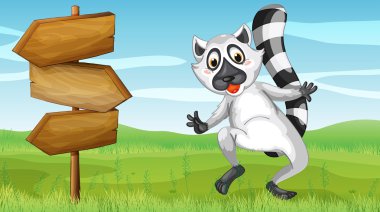 bir hayvan ayakta yanında bir tabela