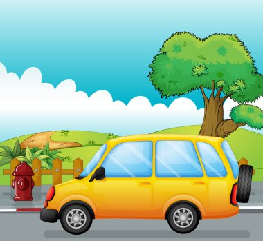 Sokakta çalışan sarı bir araba