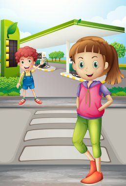 bir kız ve genç bir çocuk benzin istasyonu