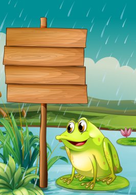 A frog near an empty wooden board clipart