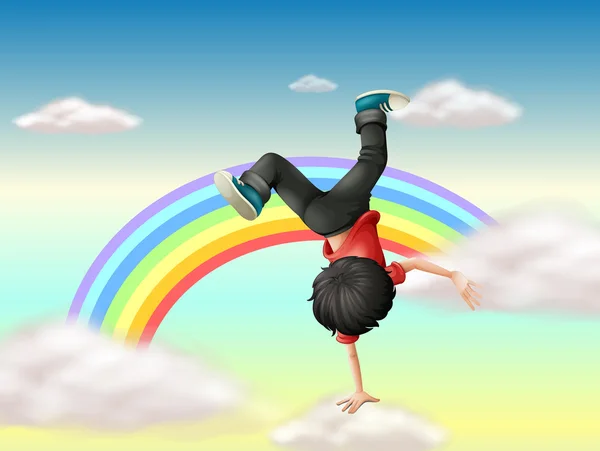 Un ragazzo che esegue una break dance lungo l'arcobaleno — Vettoriale Stock