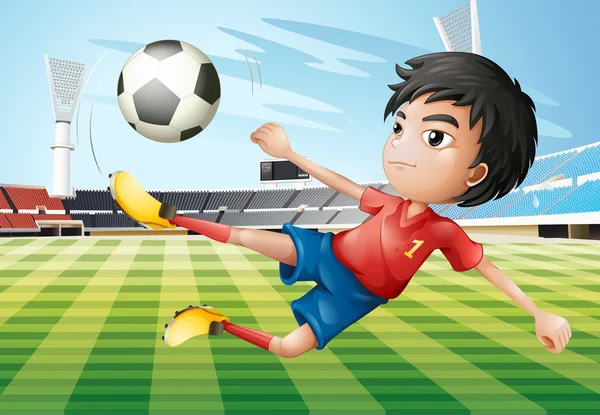 Un niño jugando al fútbol en el campo de fútbol — Vector de stock