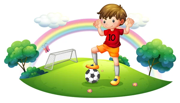 A boy in a soccer field Stock Vector