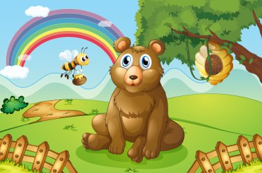 bir ayı ve yakındaki bir kovan arı