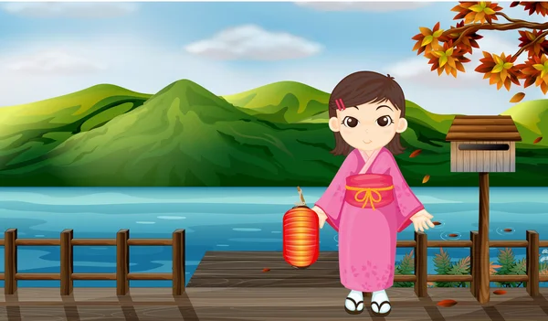 Una ragazza con un kimono che tiene una lanterna accanto a una cassetta di legno — Vettoriale Stock