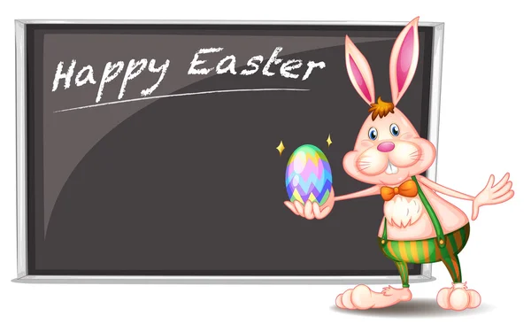 Un feliz saludo de Pascua con un conejito al lado de una tabla gris — Archivo Imágenes Vectoriales