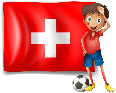İsviçre bayrağı önünde bir futbolcu