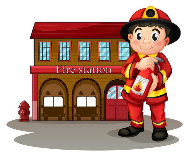 A fireman in front of a fire station holding a fire extinguisher