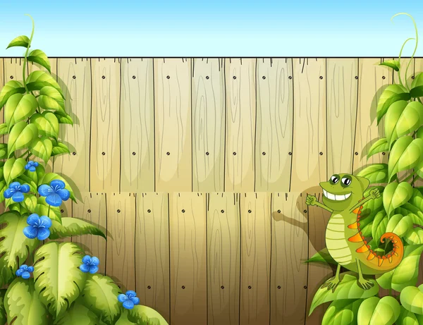 A fence with a lizard — Stock Vector
