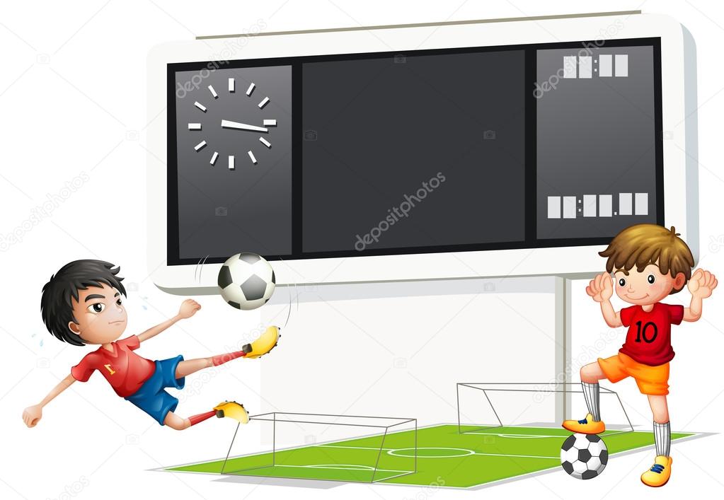 Two boys playing soccer with a scoreboard
