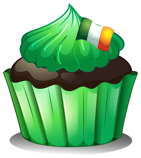 Um cupcake verde com a bandeira da Irlanda — Vetor de Stock