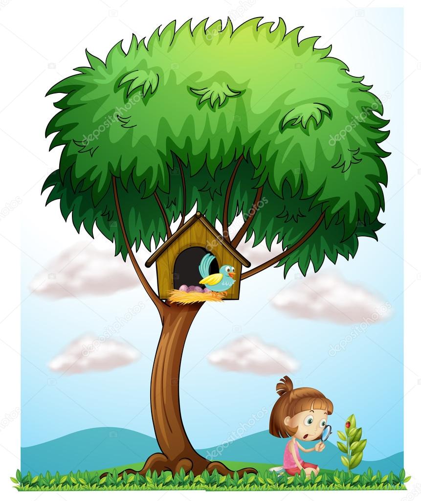 A girl with a magnifying lens under a big tree