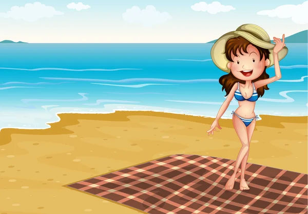 Una chica en la playa con una manta — Vector de stock