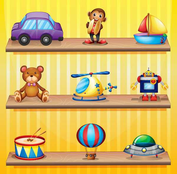 Different toys arranged at the wooden shelves