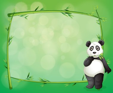 bambu yapılmış bir çerçeve yanında panda