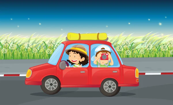 Ein Mädchen und ein Junge fahren in einem roten Auto — Stockvektor