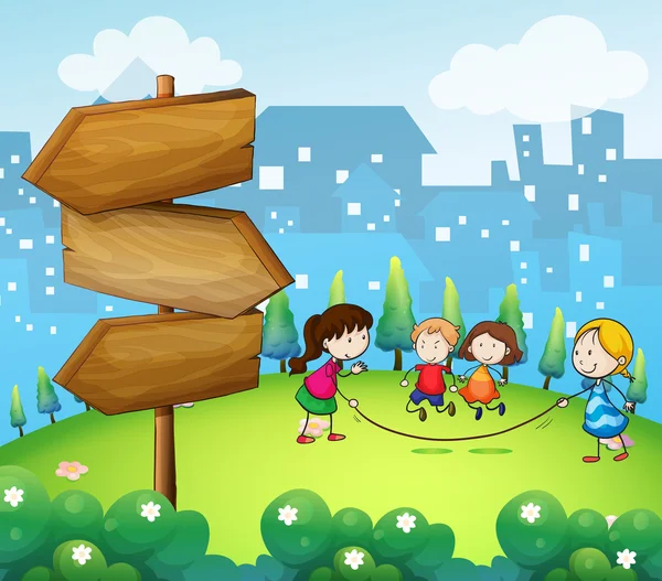 Barn som leker i bergen med en trä skylt — Stock vektor