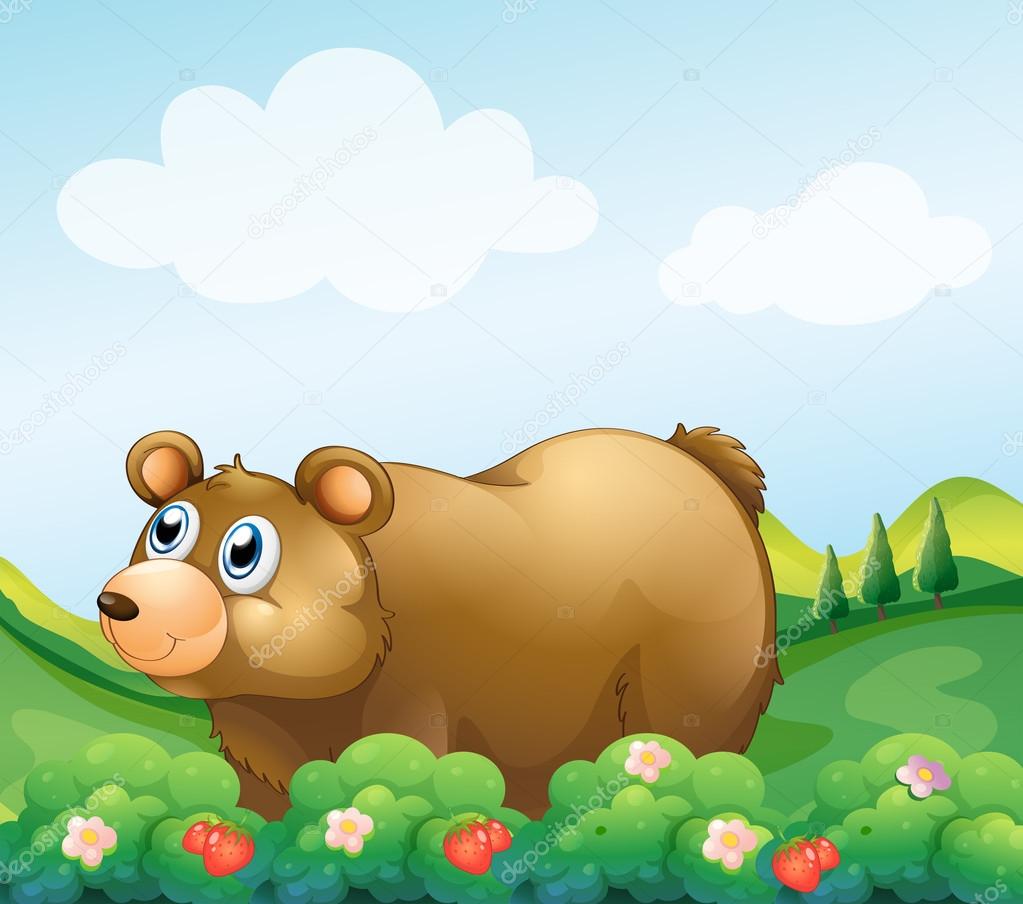 A brown bear in the strawberry garden