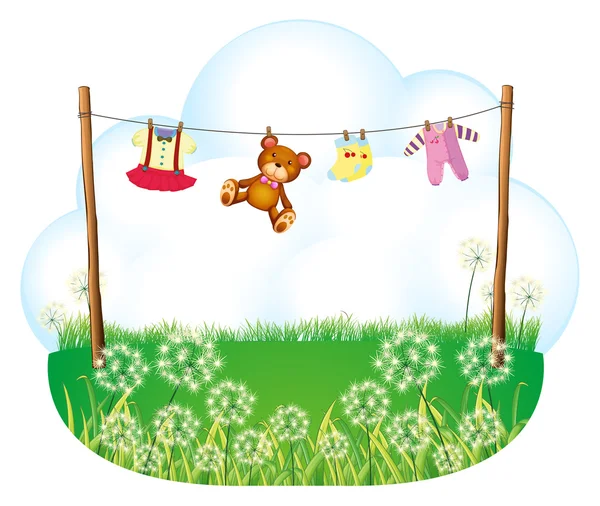 Baby things hanging above the weeds — Stock Vector