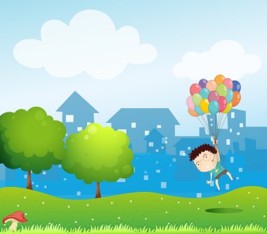 Balonlar ile havada yüzen bir çocuk