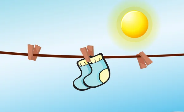 Ein Säugling Socken hängen mit Clips — Stockvektor