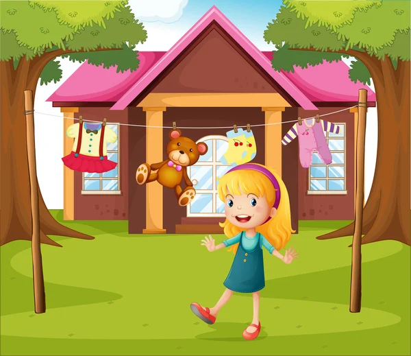 A girl in front of their house — Stock Vector