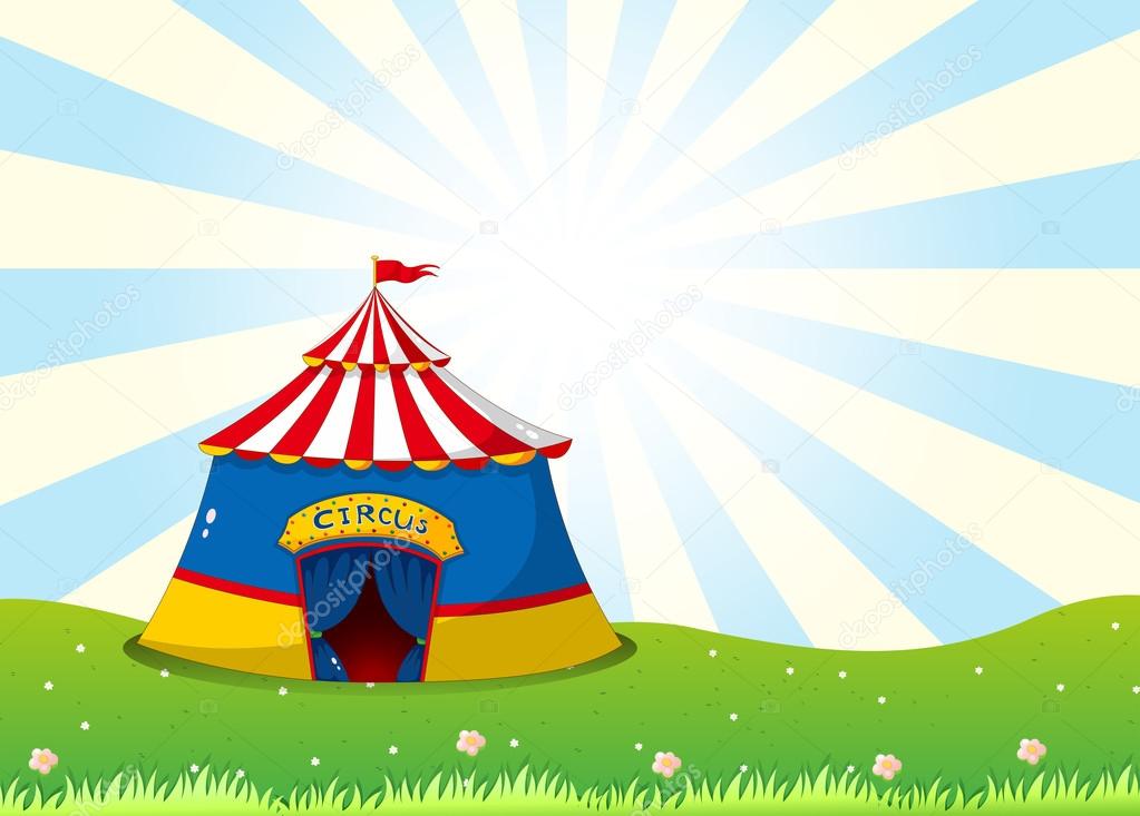 A circus tent at the top of the hill