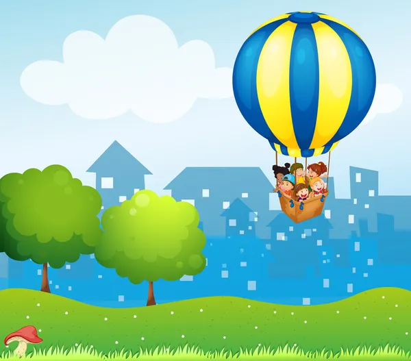A big hot air balloon with kids — Stock Vector