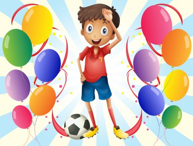 Balonlar ortasında bir futbolcu