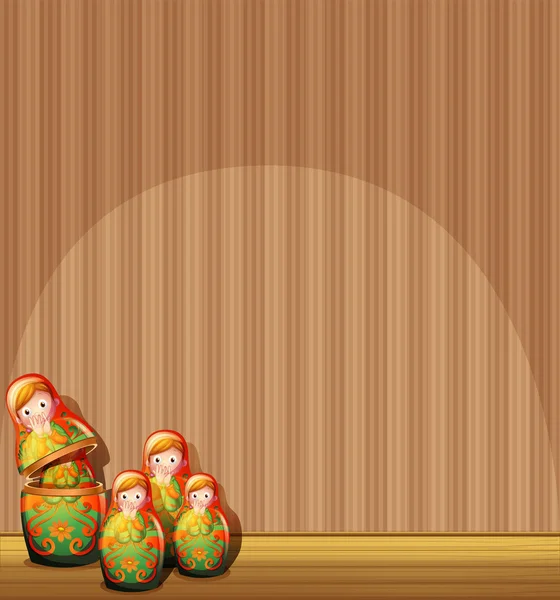 The four Russian dolls in front of an empty wall — Stock Vector
