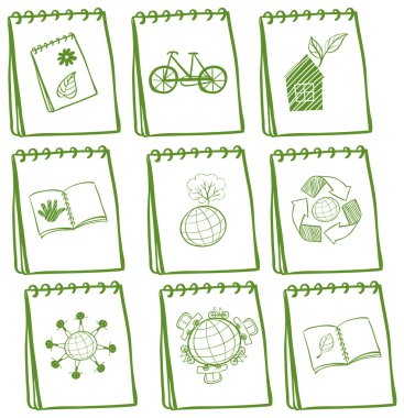 Notebooks with green drawings at the cover page clipart